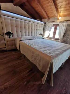 Letto o letti in una camera di L'Antica Dimora - Suites & Apartments