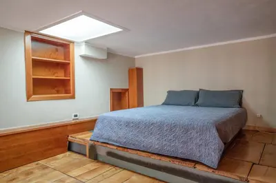 Letto o letti in una camera di Corso Vittorio Rustic Loft