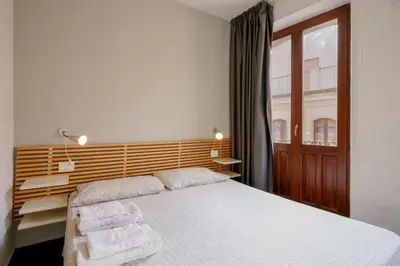 Letto o letti in una camera di Il Palazz8