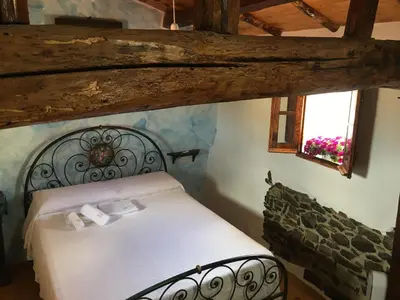 Letto o letti in una camera di Casa Murroni
