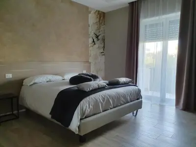 Letto o letti in una camera di Interno 6 via Cugia 5