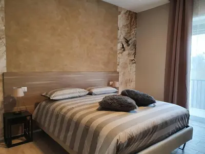 Letto o letti in una camera di Interno 6 via Cugia 5
