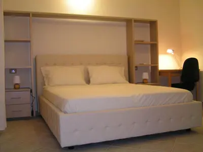 Letto o letti in una camera di Anania