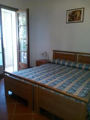 Letto o letti in una camera di B&B Il Vigneto