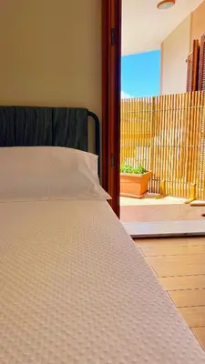 Letto o letti in una camera di Villa Iole