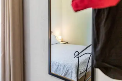 Letto o letti in una camera di Acquazzurra Rooms