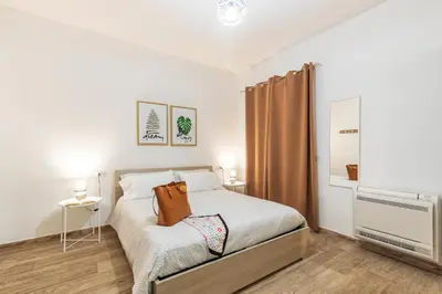 Letto o letti in una camera di Acquazzurra Rooms