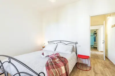 Letto o letti in una camera di Acquazzurra Rooms