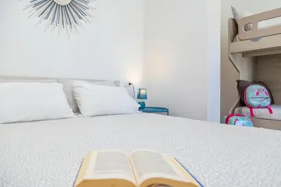 Letto o letti in una camera di Acquazzurra Rooms