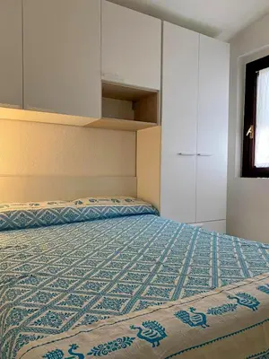 Letto o letti in una camera di Villa Caterina a pochi passi dalla spiaggia con 3 Camere e Giardino Privato