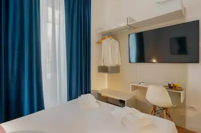 Letto o letti in una camera di CrossRoad Four - locazione turistica
