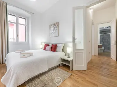 Letto o letti in una camera di Baylle Residence House