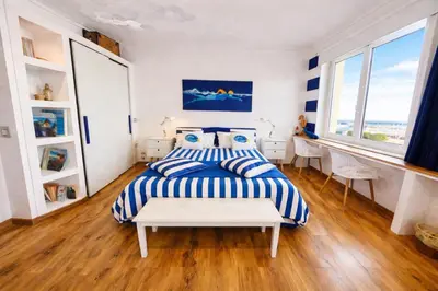 Letto o letti in una camera di Il Profumo del Mare GuestHouse