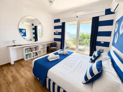 Letto o letti in una camera di Il Profumo del Mare GuestHouse
