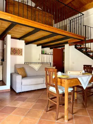 Area soggiorno di Fantastica casa vacanze a Teulada