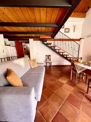 Area soggiorno di Fantastica casa vacanze a Teulada