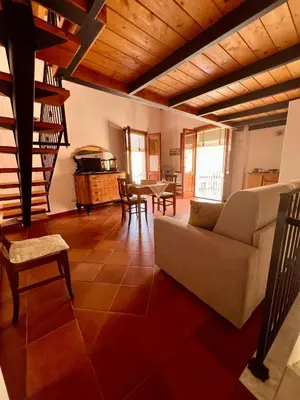 Area soggiorno di Fantastica casa vacanze a Teulada