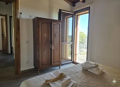 Letto o letti in una camera di S'Arrosa de Monti