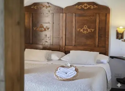 Letto o letti in una camera di S'Arrosa de Monti