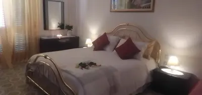 Letto o letti in una camera di B&B Cuore e Vento