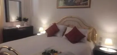 Letto o letti in una camera di B&B Cuore e Vento