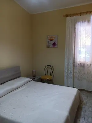Letto o letti in una camera di Vacanze a Solanas con Clima CUP1863