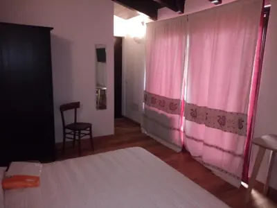 Letto o letti in una camera di sa ribera
