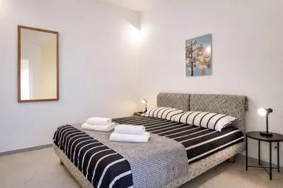 Letto o letti in una camera di Nature Apartments Sardegna