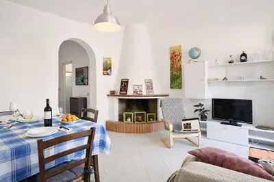 TV o dispositivi per l'intrattenimento presso Nature Apartments Sardegna