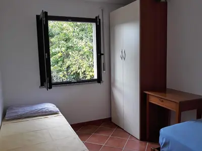 Letto o letti in una camera di Il sughereto