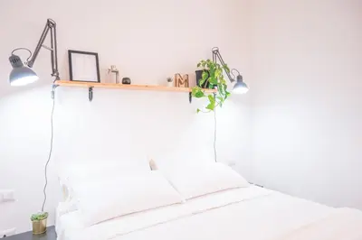 Letto o letti in una camera di Minimalist Chic a Villanova 3Bdr - 2Bth - WiFi