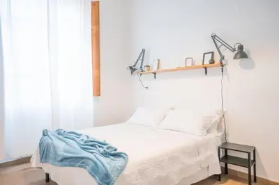 Letto o letti in una camera di Minimalist Chic a Villanova 3Bdr - 2Bth - WiFi
