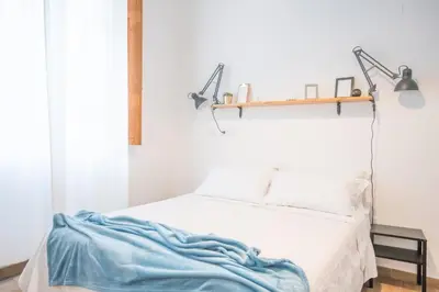 Letto o letti in una camera di Minimalist Chic a Villanova 3Bdr - 2Bth - WiFi