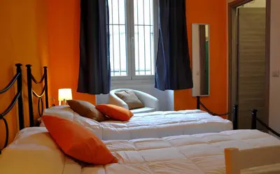 Letto o letti in una camera di S'arenada