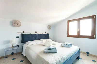 Letto o letti in una camera di Giaco's Apartments 1
