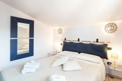 Letto o letti in una camera di Giaco's Apartments 1