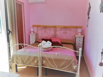 Letto o letti in una camera di B&B Gi & Giò