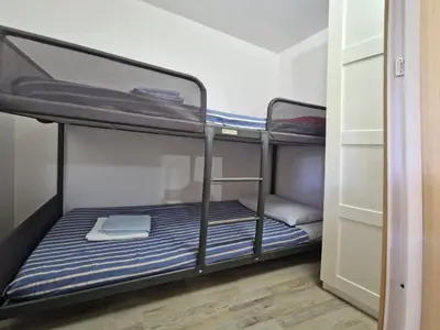 Letto o letti in una camera di New Camping Coccorrocci