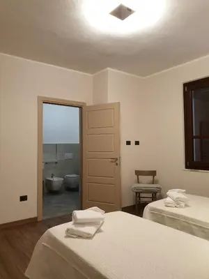 Letto o letti in una camera di B&B al civico16