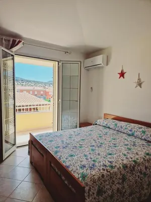 Letto o letti in una camera di Affittacamere Sofy