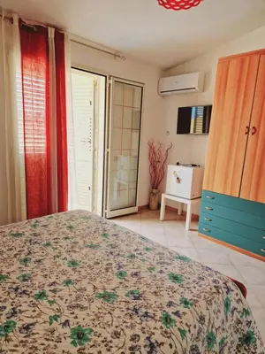 Letto o letti in una camera di Affittacamere Sofy