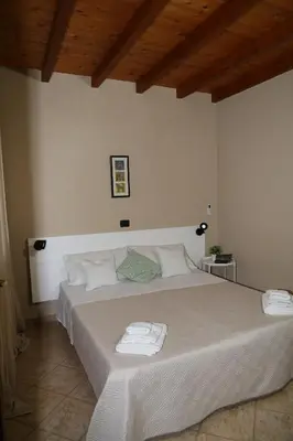 Letto o letti in una camera di Villa Cruccuris