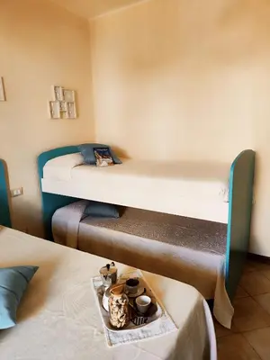 Letto o letti in una camera di Casa di Lisa