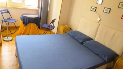 Letto o letti in una camera di Luna Rossa Rooms