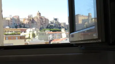 Vista generica su Cagliari o vista sulla città dall'interno dell'affittacamere