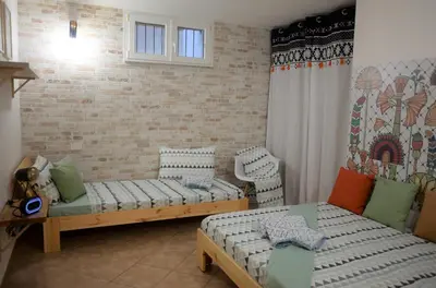 Letto o letti in una camera di Murdegus Maison - Vivi il tuo Sogno in Sardegna!