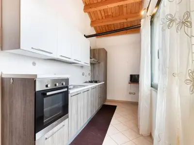 Cucina o angolo cottura di Homes in the Lagoons of Santa Giusta