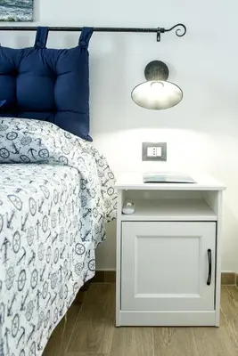Letto o letti in una camera di ittiturismo S.Croce