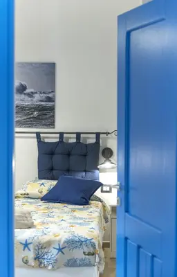 Letto o letti in una camera di ittiturismo S.Croce