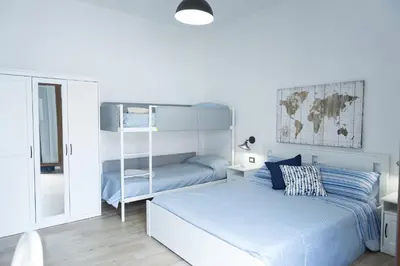 Letto o letti in una camera di ittiturismo S.Croce
